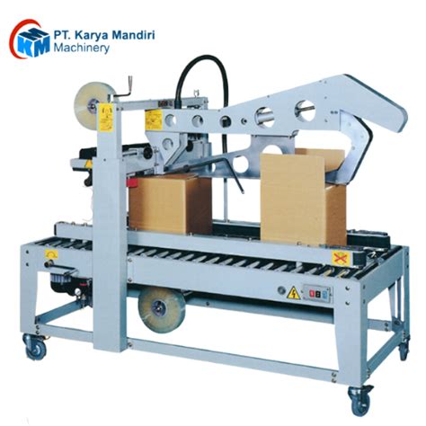 Auto Uniform Flap Folding Carton Sealer EC 705R Karya Mandiri Machinery