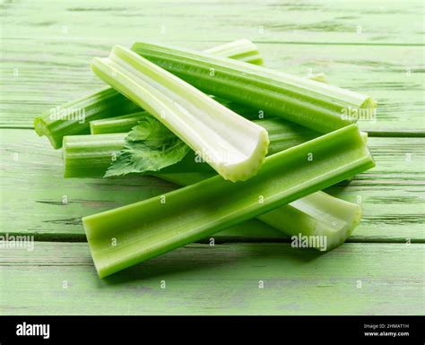 Pile of celery ribs isolated on white background Stock Photo - Alamy