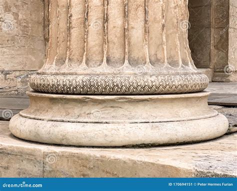 Base Of A Greek Stone Column At The Parthenon Of Acropolis In Athens