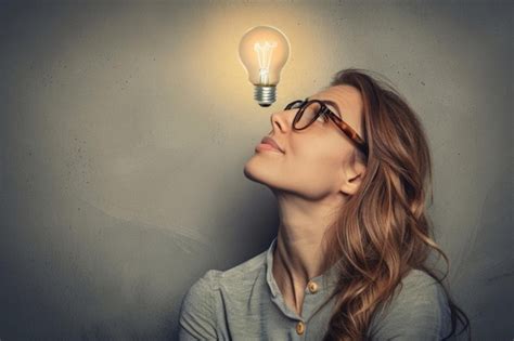 premium photo woman  glasses  lightbulb idea