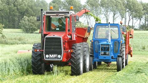 Massey Ferguson 1200 Working Hard In The Field Chopping Grass W Taarup 502 Forage Harvester