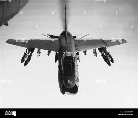 An A 7 Corsair Ii Flies Toward Targets In Vietnam Armed With Bomb