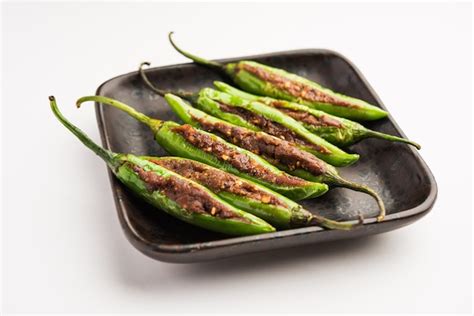 Premium Photo Bharwa Masala Mirch Or Stuffed Green Chillies Or Bharli