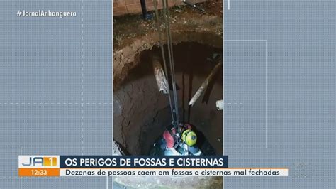 Menino Resgatado Ap S Cair Dentro De Cisterna Enquanto Jogava Bola E