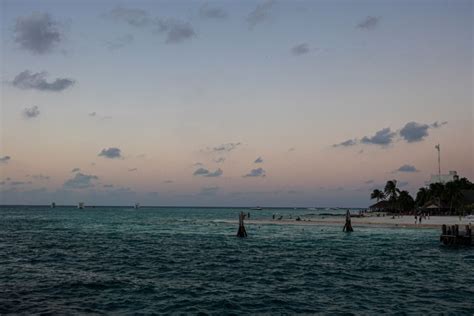 From Canc N Isla Mujeres Sunset Catamaran Cruise