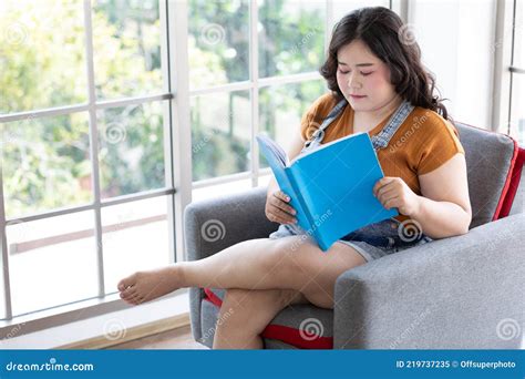 Chubby Woman Reading A Book On Free Time Stock Image Image Of Curvy Chubby 219737235