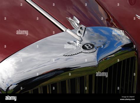 Bentley emblem on the front of the classic car Stock Photo - Alamy