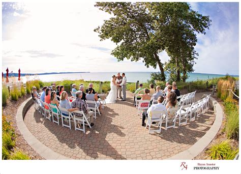 A Lake Michigan Beach wedding held at the Homestead in Glen Arbor at the Cafe Manitou ...