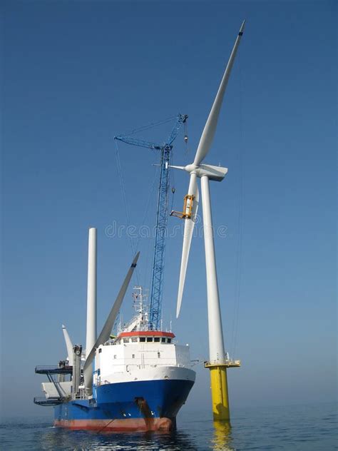 Offshore Wind Turbine Installation Stock Photo - Image of port, clouds ...