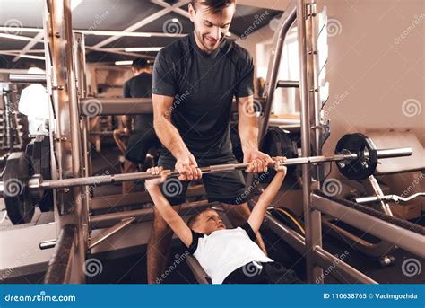 Father And Son In The Gym Father And Son Spend Time Together And Lead