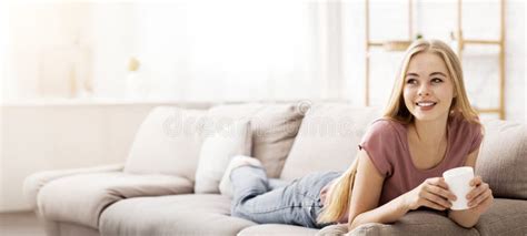 Cheerful Blonde Girl Drinking Tea At Home Stock Image Image Of Lifestyle Carefree 343008741