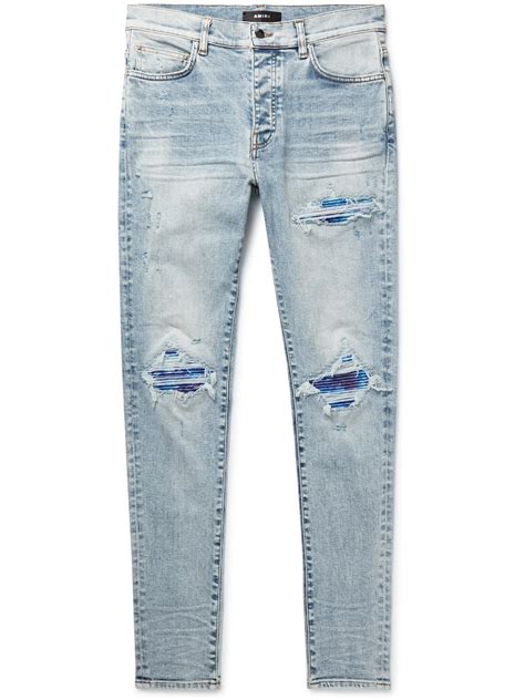 Amiri Mx1 Skinny Fit Tie Dyed Drill Trimmed Distressed Jeans In Blue