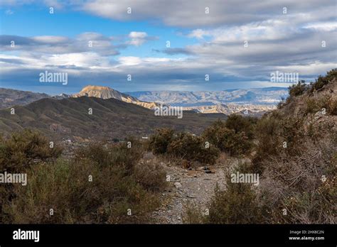 A hiking trail leading through the hills and canyons of the Tabernas ...