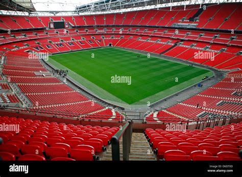 Inside Wembley Football Soccer Stadium Showing The Red Seats Pitch And