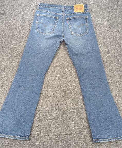 Levis 527 Jeans 33x30 Blue Low Rise Bootcut Denim Cow… Gem