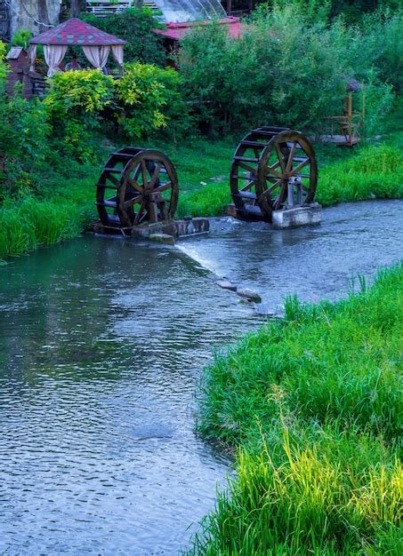 Premium Photo Photo Of An Old Ancient Water Wheels On The River