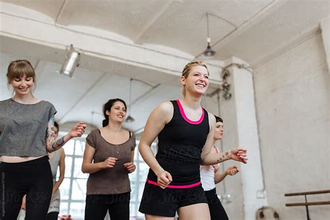 "Aerobics Instructor Leading Class" by Stocksy Contributor "VegterFoto ...