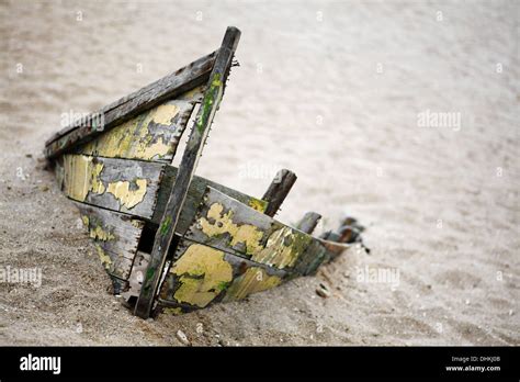 Color Picture Of An Abandoned Boat Stuck In Sand Stock Photo Alamy