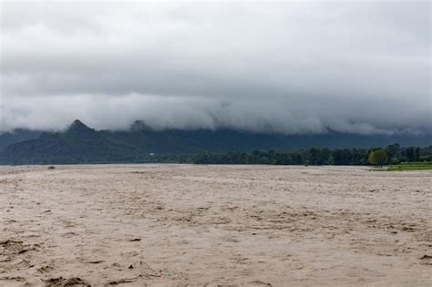 Premium Photo Heavy Flood In The Valley Wash Away Crops And Fields