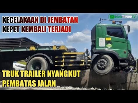 Sopir Ngantuk Truk Trailer Nyangkut Pembatas Jalan Jembatan Kepet