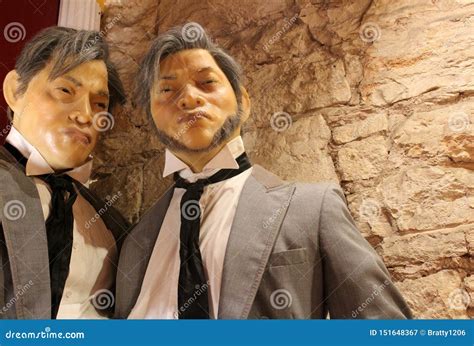 Two Male Mannequins Dressed In Suits And Ties Inside Museum Of The