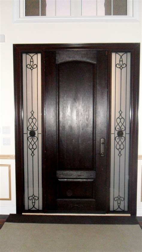 Cherry Grain Dark Walnut Fiberglass Door With Wrought Iron Sidelites In Toronto Ontario