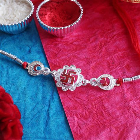 Send Sparkling Silver Swastika Rakhi Online Rkh Giftalove