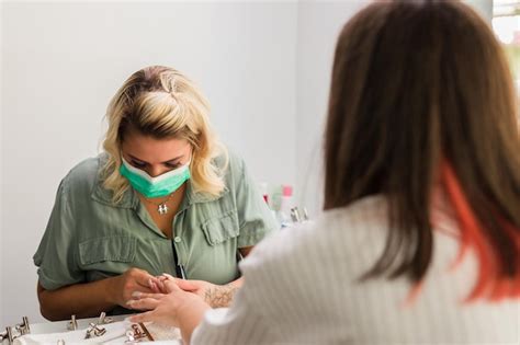 Premium Photo Woman Getting Her Nails Done