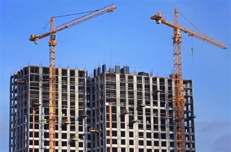 High Rise Construction Cranes And Array Of Buildings Under Construction