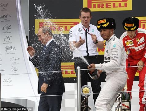 F1 S Lewis Hamilton Soaks Vladimir Putin With Champagne At Sochi Grand