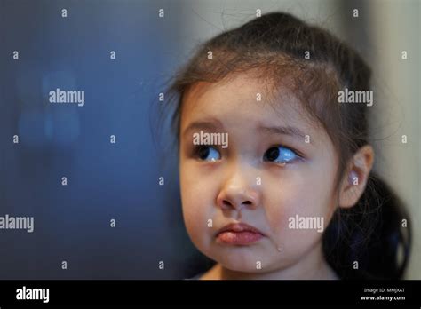 Upset crying girl at home Stock Photo - Alamy