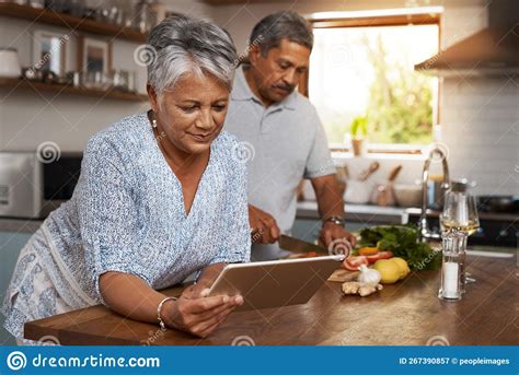 Remember The Days Of Recipe Books A Mature Woman Using A Digital