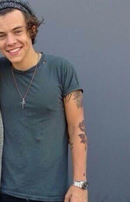 Harry Styles Adds a Giant New Rose Tattoo to His Arm- PopStarTats