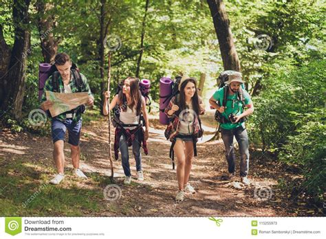 Trekking, Camping And Wild Life Concept. Four Best Friends Are Hiking ...