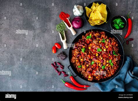 Delicious Chili Con Carne In A Pan Served With A Side Of Tortilla Chips