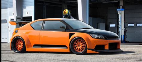 2011 Scion Tc Tuner Car With Men On Top