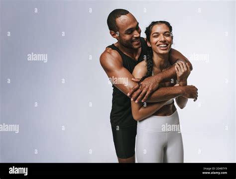 Cheerful Male And Female Athletes Standing Together Having Fun Fitness