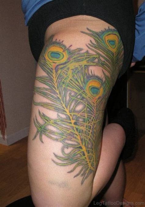 49 Stunning Peacock Tattoos On Thigh Leg Tattoo Designs