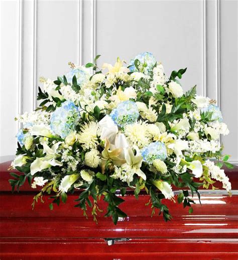 Blue Sympathy Casket Spray | Avas Flowers