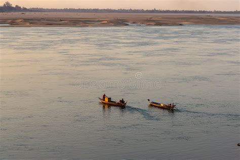 Fisherman on the Traditional Boat on the Mekong River in Cambodia Stock ...