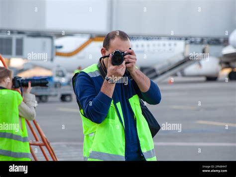plane spotters   airport photographers observe  photograph