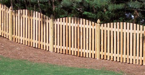 Custom Wood Scalloped Picket Fence Design For Property Incline By Mossy