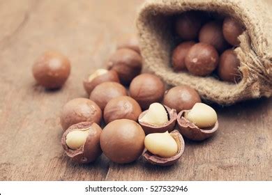 Organic Macadamia Nut On Wooden Table Stock Photo 524888014 Shutterstock