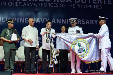 President Rodrigo Roa Duterte Attaches The Streamer On The Banner Of