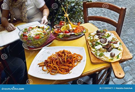 Unidentified People Eating Traditional Italian Food in Outdoor ...