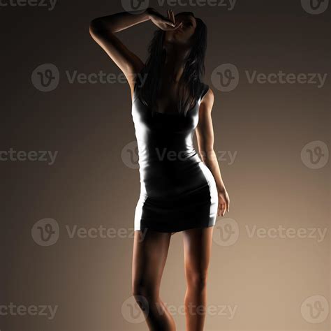 Sexy Brunette Woman Posing In Dark Studio 5647296 Stock Photo At Vecteezy