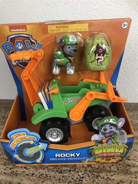 PAW PATROL DINO Rescue Rocky Deluxe Rev Up Vehicle With Mystery Figure