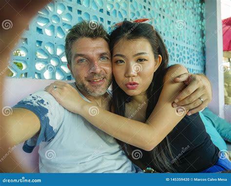 Happy Mixed Ethnicity Couple In Love Smiling Cheerful With Handsome