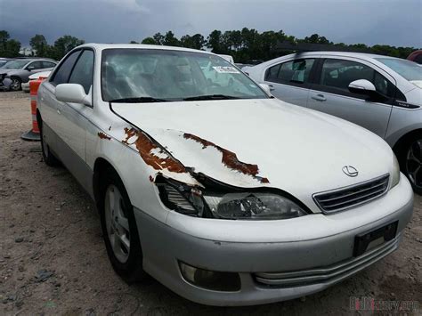 Report JT8BF28G9Y5086703 LEXUS ES300 2000 WHITE GAS - price and damage history