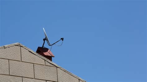 Premium Photo Satellite Dish In Front Of A Blue Sky